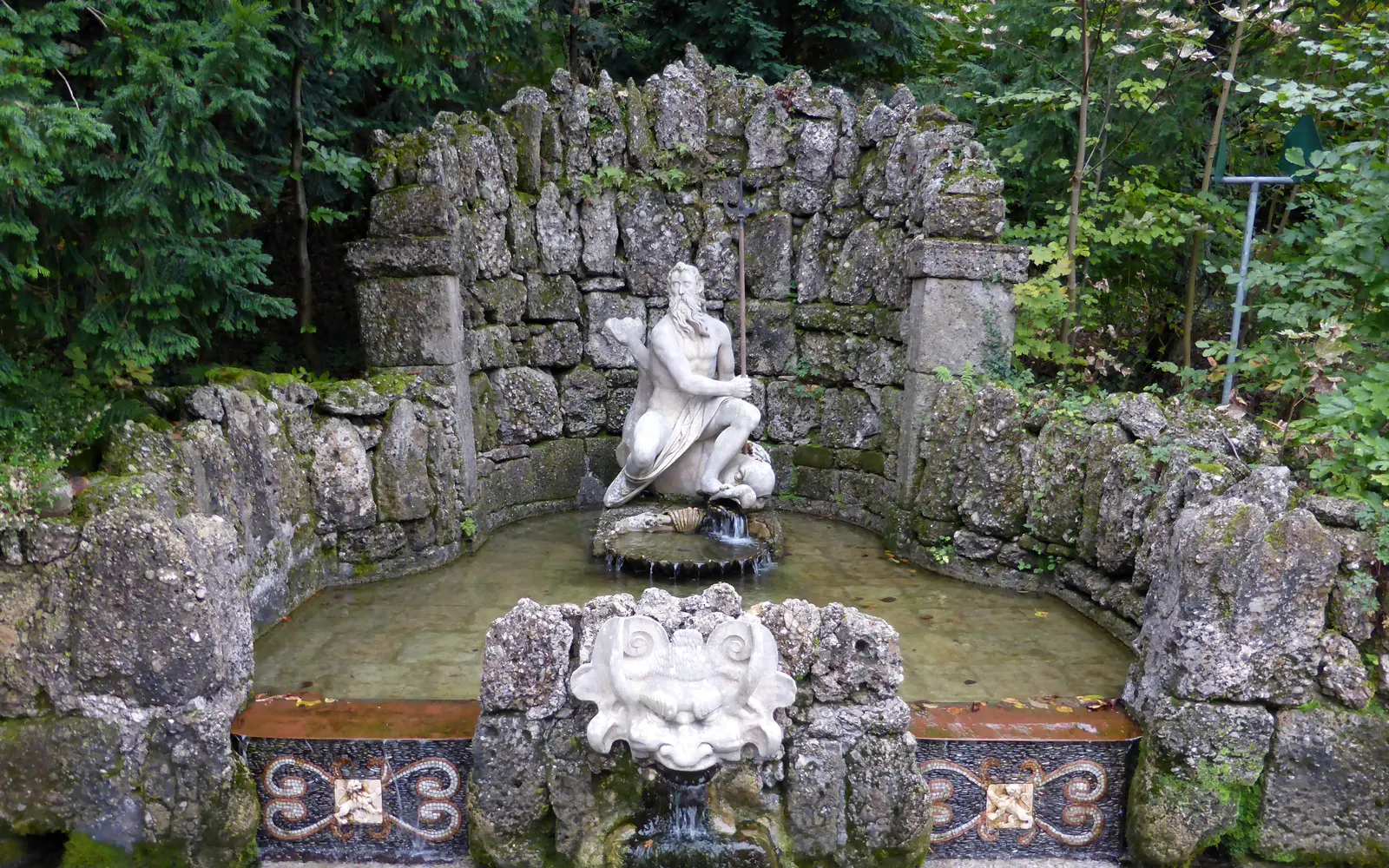 The Neptune Grotto at Hellbrunn with its rock walls and statue